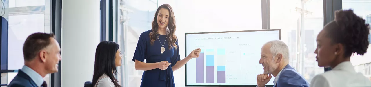 senior vice president in a meeting discussing talent management policies that contribute to the company's success 