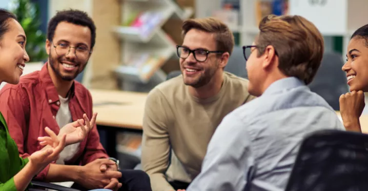A group of colleagues talking to each other