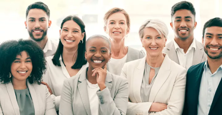 A group of employee smiling