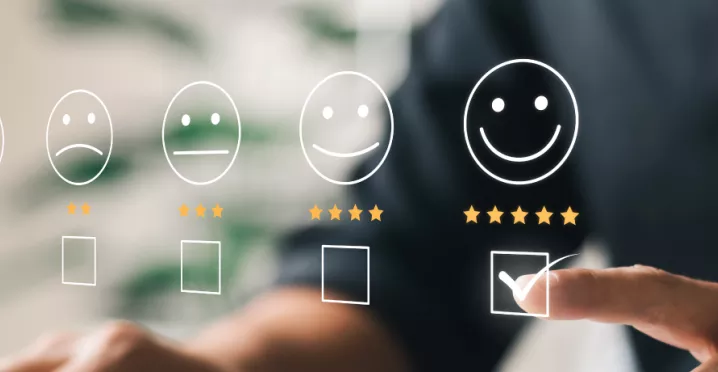 Shows an employee selecting an scale whether they are happy or not with their job