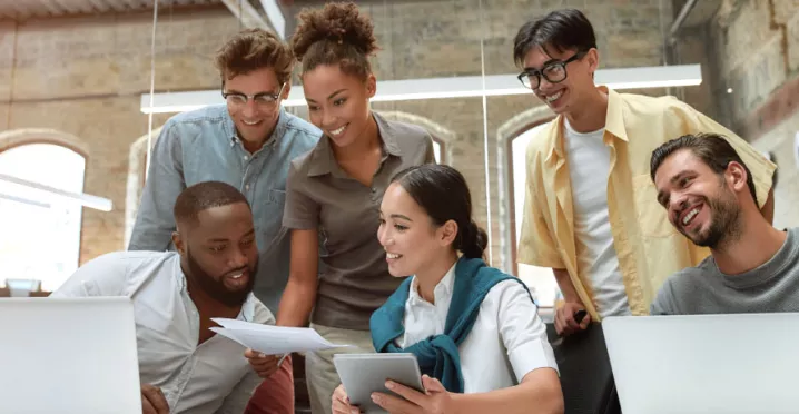 Team collaborating around a table at work