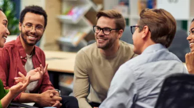 A group of colleagues talking to each other