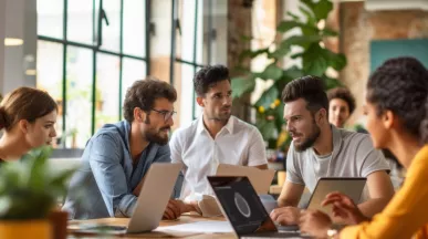 Team discussing at a table about strategies to improve employee engagement