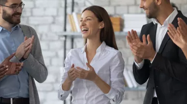 Employee being recognized by their team