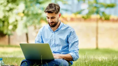 An employee enjoying working outside during the summer